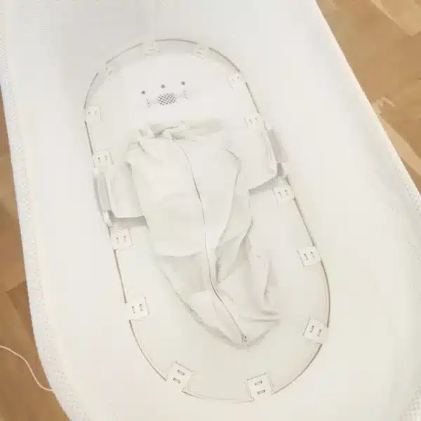 Inside view of a fully cleaned Snoo bassinet with fresh sack and mesh
