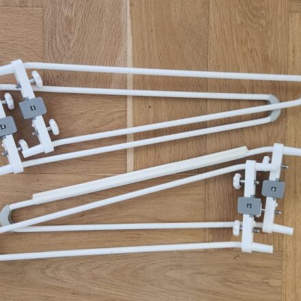 Pair of original Snoo Smart Sleeper replacement legs – standard size, white with grey foot caps